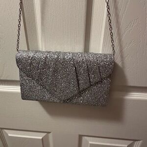 Women’s silver clutch!! 
Glitter style